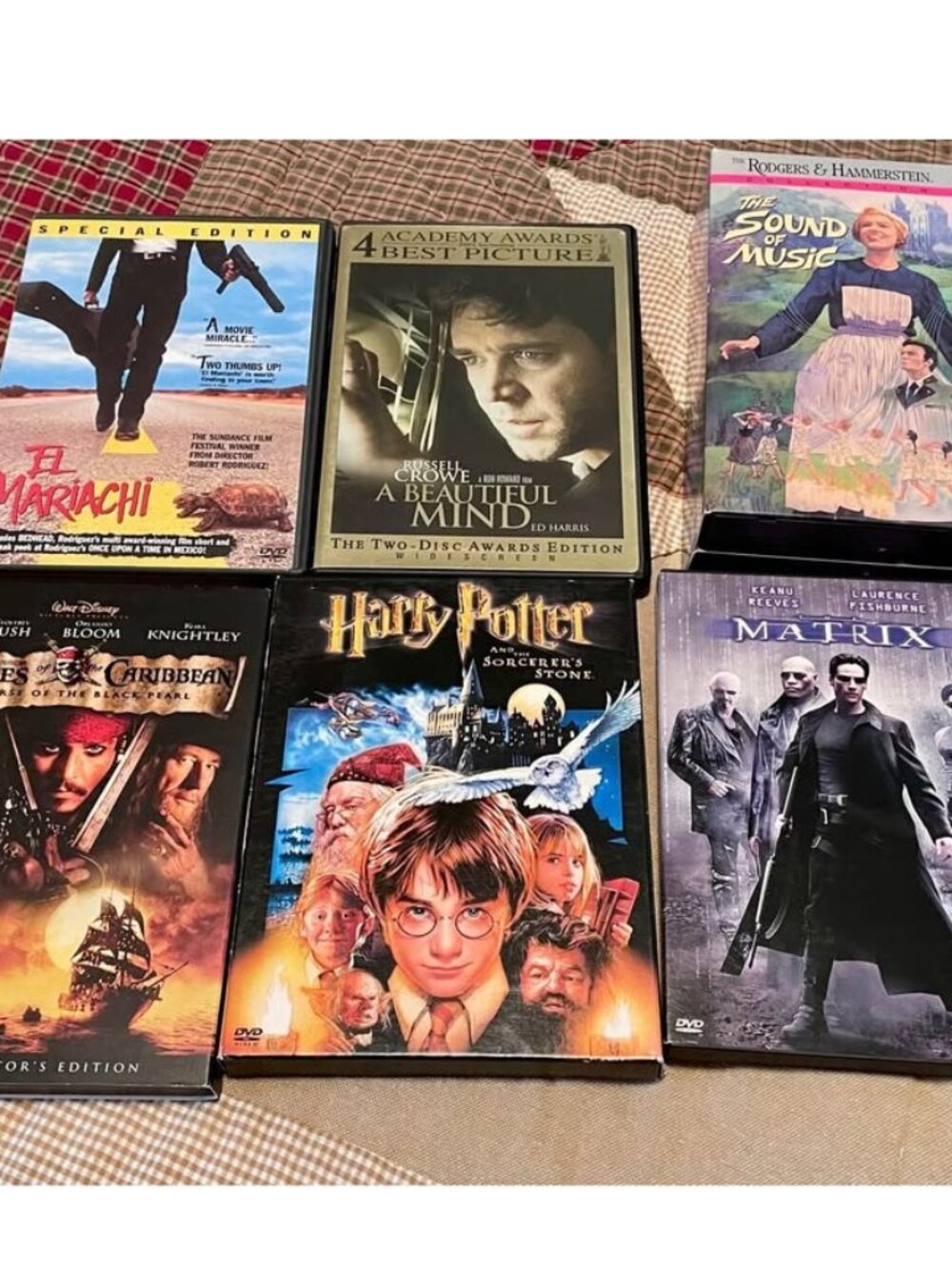 Set of 5 DVDs and 1 VHS set as pictured